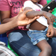 A child affected by lead rain that fell continually in the local children’s playground.